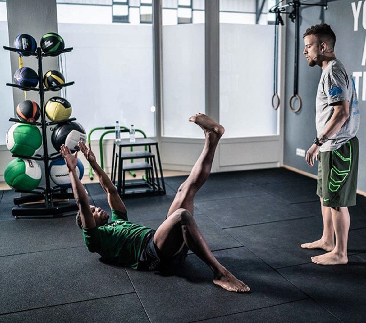 Player engaging in flexibility and mobility exercises